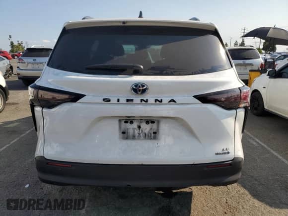 2023 Toyota Sienna LE with VIN 5TDBRKECXPS149259, listed as a Copart auction lot 80129325 with 148,265 mi miles and Salvage title. Bid and sale history available at DreamBid. Image 6.