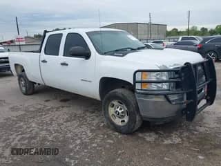 2012 Chevrolet Silverado 2500HD Work Truck z VIN 1GC1CVCGXCF202119, wystawiony jako IAAI lot #41905706 z przebiegiem 181 336 mil mil oraz . Historia ofert i sprzedaży dostępna na DreamBid. Obrazek 1.