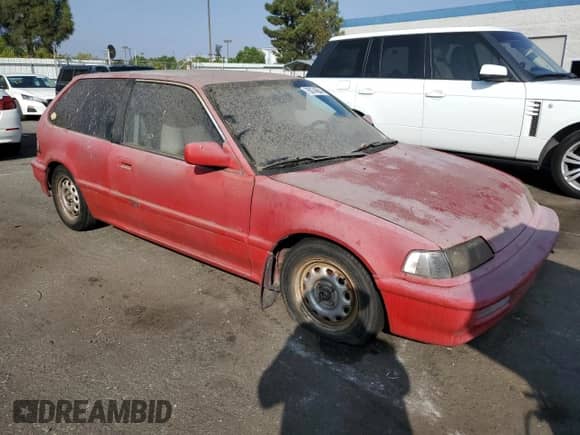 1990 Honda Civic with VIN 2HGED6341LH559585, listed as a Copart auction lot 76074684 with 199,879 mi miles and Salvage title. Bid and sale history available at DreamBid. Image 4.