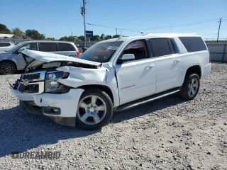 2015 Chevrolet Suburban LT с VIN 1GNSCJKC6FR507851, выставлен на аукционе Copart как лот 80453335 с пробегом Не указан миль и Списание • Salvage title. История ставок и продаж доступна на DreamBid. Изображение 1.