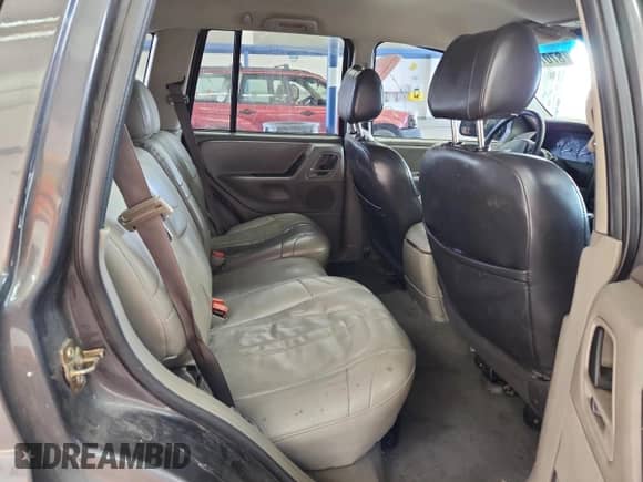 2003 Jeep Grand Cherokee Laredo with VIN 1J4GW48N23C612962, listed as a Copart auction lot 87071755 with 257,670 mi miles and Salvage title. Bid and sale history available at DreamBid. Image 11.