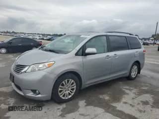 2014 Toyota Sienna XLE with VIN 5TDYK3DC7ES474017, listed as a Copart auction lot 81595945 with 185,704 mi miles and Salvage title. Bid and sale history available at DreamBid. Image 1.
