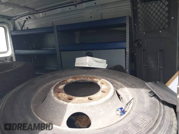 2009 Ford Econoline Cargo Commercial z VIN 1FTNE14W09DA38068, wystawiony jako IAAI lot #41690071 z przebiegiem 182 337 mil mil oraz . Historia ofert i sprzedaży dostępna na DreamBid. Obrazek 8.