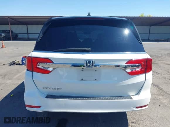 2019 Honda Odyssey EX-L z VIN 5FNRL6H7XKB096727, wystawiony jako IAAI lot #43225843 z przebiegiem 116 705 mil mil oraz . Historia ofert i sprzedaży dostępna na DreamBid. Obrazek 16.