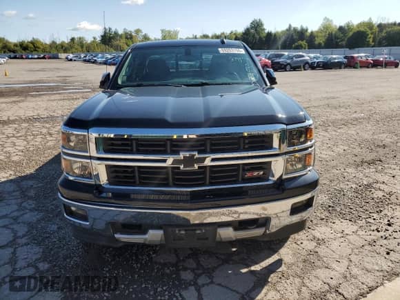 2015 Chevrolet Silverado 1500 LT z VIN 1GCVKREC3FZ379958, wystawiony jako Copart lot #69263155 z przebiegiem 84 522 mil mil oraz Szkoda całkowita • Salvage title. Historia ofert i sprzedaży dostępna na DreamBid. Obrazek 5.