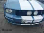 2007 Ford Mustang GT Deluxe z VIN 1ZVFT82HX75216807, wystawiony jako IAAI lot #43383897 z przebiegiem 132 000 mil mil oraz . Historia ofert i sprzedaży dostępna na DreamBid. Obrazek 17.
