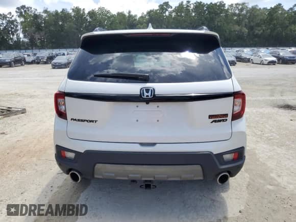 2025 Honda Passport TrailSport with VIN 5FNYF8H69SB009955, listed as a Copart auction lot 67210885 with 13,002 mi miles and Salvage title. Bid and sale history available at DreamBid. Image 6.
