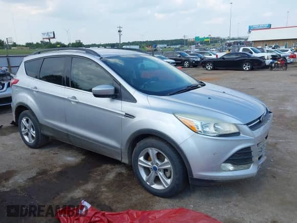 2014 Ford Escape SE with VIN 1FMCU0GX0EUB15147, listed as a IAAI auction lot 43236563 with 140,191 mi miles and . Bid and sale history available at DreamBid. Image 14.