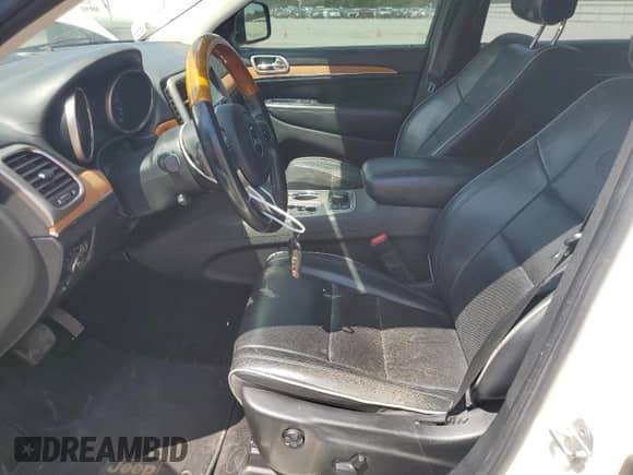 2011 Jeep Grand Cherokee Overland with VIN 1J4RR6GT8BC681245, listed as a Copart auction lot 70339945 with 185,894 mi miles and Salvage title. Bid and sale history available at DreamBid. Image 7.