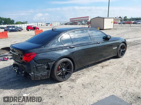 2013 BMW 7 Series 750Li xDrive with VIN WBAYF8C54DD141690, listed as a IAAI auction lot 42804428 with 120,000 mi miles and . Bid and sale history available at DreamBid. Image 4.