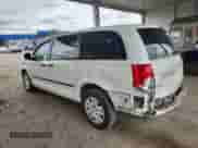 2013 Dodge Grand Caravan American Value with VIN 2C4RDGBG6DR765319, listed as a Copart auction lot 69782895 with 129,861 mi miles and Salvage title. Bid and sale history available at DreamBid. Image 2.