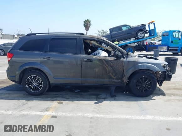 2018 Dodge Journey SE with VIN 3C4PDCAB5JT497376, listed as a IAAI auction lot 42998171 with Not provided miles and . Bid and sale history available at DreamBid. Image 12.