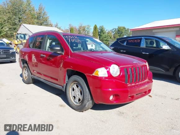 2007 Jeep Compass Sport with VIN 1J8FF47WX7D203953, listed as a IAAI auction lot 43427051 with 142,880 mi miles and . Bid and sale history available at DreamBid. Image 1.