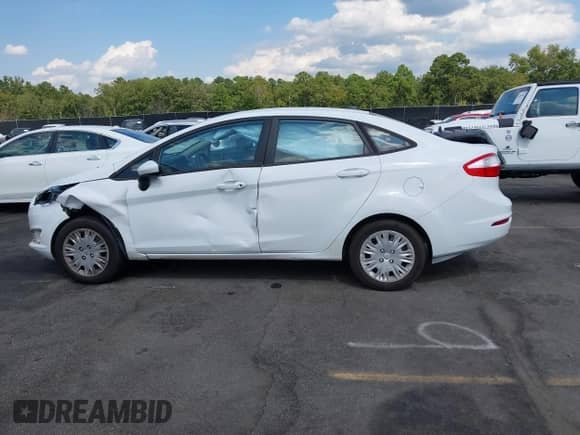 2015 Ford Fiesta S z VIN 3FADP4AJ9FM144900, wystawiony jako IAAI lot #43153351 z przebiegiem 154 259 mil mil oraz . Historia ofert i sprzedaży dostępna na DreamBid. Obrazek 14.