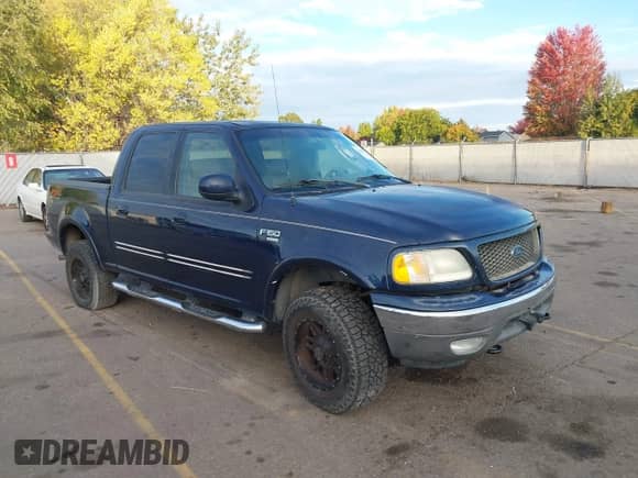 2003 Ford F-150 XLT z VIN 1FTRW08L73KD26519, wystawiony jako IAAI lot #43430541 z przebiegiem Nie podano mil oraz . Historia ofert i sprzedaży dostępna na DreamBid. Obrazek 1.