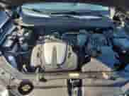 2010 Hyundai Santa Fe Limited с VIN 5NMSKDAGXAH379970, выставлен на аукционе Copart как лот 69197225 с пробегом 142 051 миль миль и Списание • Salvage title. История ставок и продаж доступна на DreamBid. Изображение 11.