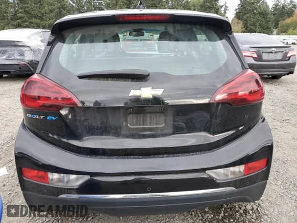 2018 Chevrolet Bolt EV LT с VIN 1G1FW6S09J4113067, выставлен на аукционе Copart как лот 85864645 с пробегом 71 980 миль миль и Списание • Salvage title. История ставок и продаж доступна на DreamBid. Изображение 6.