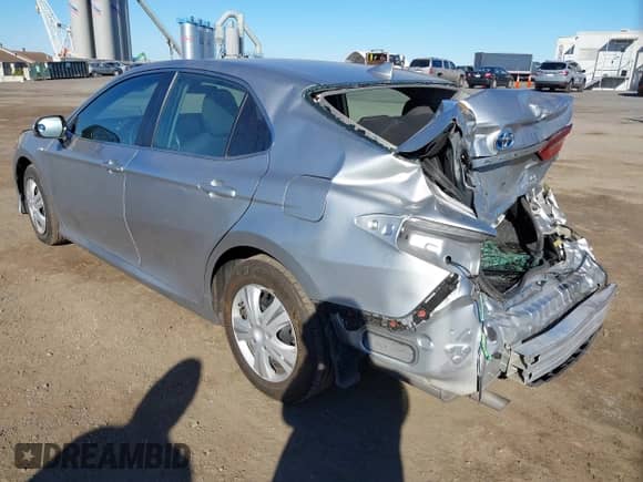 2021 Toyota Camry Hybrid LE with VIN 4T1C31AK5MU561685, listed as a IAAI auction lot 43388923 with 201,356 mi miles and . Bid and sale history available at DreamBid. Image 3.