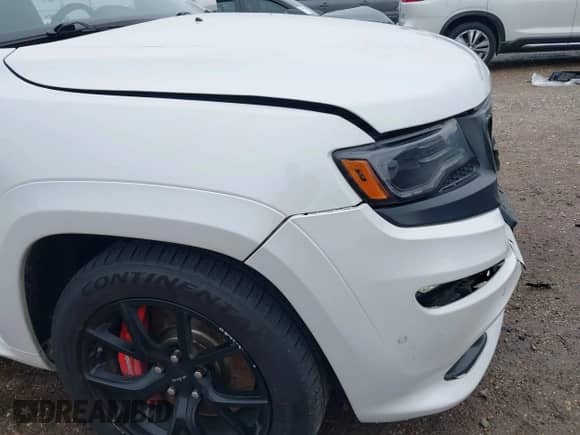 2016 Jeep Grand Cherokee SRT with VIN 1C4RJFDJ0GC456325, listed as a IAAI auction lot 41425211 with 159,746 mi miles and . Bid and sale history available at DreamBid. Image 18.