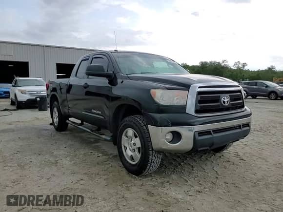 2013 Toyota Tundra z VIN 5TFUM5F1XDX046077, wystawiony jako Copart lot #65893365 z przebiegiem 240 153 mil mil oraz Szkoda całkowita • Salvage title. Historia ofert i sprzedaży dostępna na DreamBid. Obrazek 14.