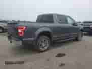 2019 Ford F-150 XLT with VIN 1FTEW1EP1KFA92980, listed as a Copart auction lot 84297305 with 127,374 mi miles and Salvage title. Bid and sale history available at DreamBid. Image 3.