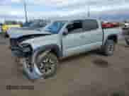 2020 Toyota Tacoma SR5 with VIN 5TFCZ5AN2LX216308, listed as a Copart auction lot 69860245 with 58,698 mi miles and Salvage title. Bid and sale history available at DreamBid. Image 1.