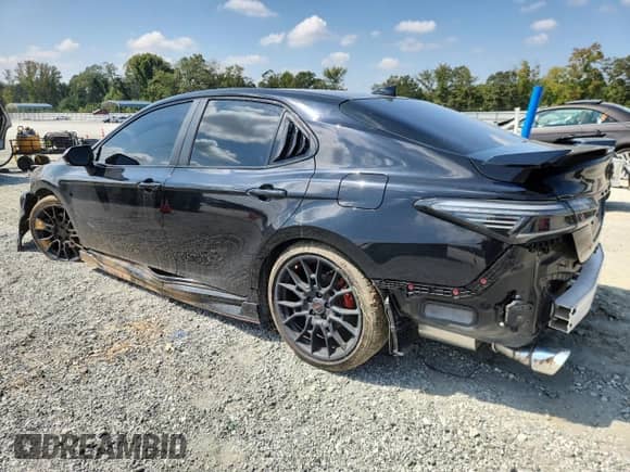 2024 Toyota Camry TRD with VIN 4T1KZ1AK2RU095604, listed as a Copart auction lot 82082705 with 32,656 mi miles and Salvage title. Bid and sale history available at DreamBid. Image 2.