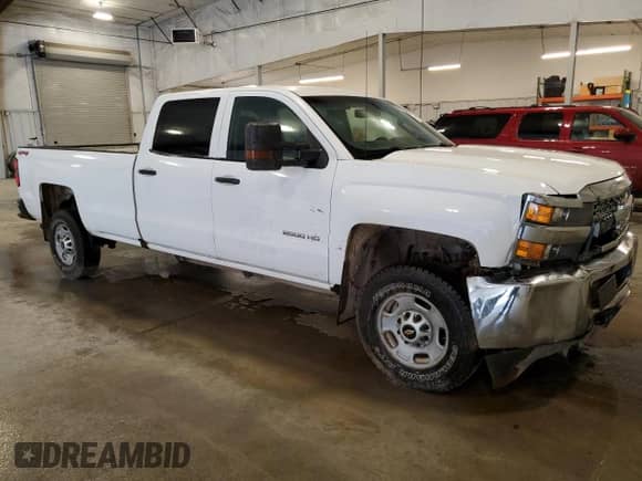 2019 Chevrolet Silverado 2500HD Work Truck z VIN 1GC1KREG6KF138117, wystawiony jako Copart lot #59977305 z przebiegiem 115 398 mil mil oraz Szkoda całkowita • Salvage title. Historia ofert i sprzedaży dostępna na DreamBid. Obrazek 4.