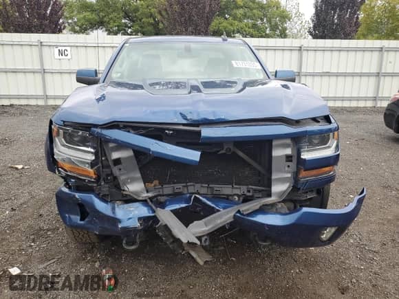 2016 Chevrolet Silverado 1500 LT with VIN 1GCVKREC3GZ370338, listed as a Copart auction lot 81731035 with 122,136 mi miles and Salvage title. Bid and sale history available at DreamBid. Image 5.