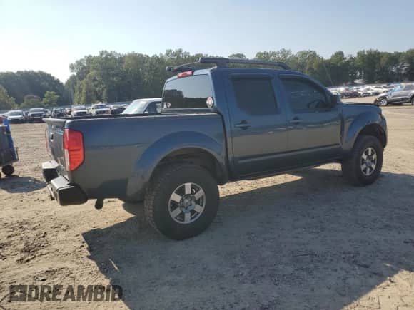 2013 Nissan Frontier Pro-4X with VIN 1N6AD0EV6DN746150, listed as a Copart auction lot 80648885 with 201,724 mi miles and Clean title. Bid and sale history available at DreamBid. Image 3.