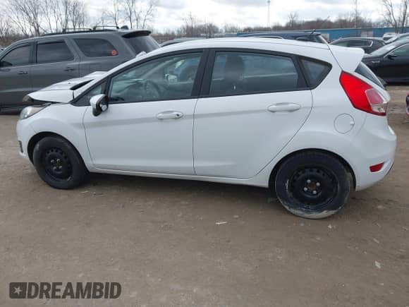 2017 Ford Fiesta S z VIN 3FADP4TJ2HM161814, wystawiony jako IAAI lot #41849003 z przebiegiem 107 836 mil mil oraz . Historia ofert i sprzedaży dostępna na DreamBid. Obrazek 14.