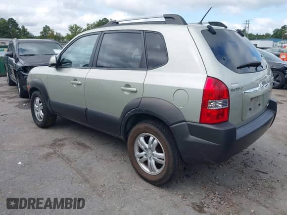 2006 Hyundai Tucson GLS with VIN KM8JN72D86U257564, listed as a IAAI auction lot 43199464 with 99,221 mi miles and . Bid and sale history available at DreamBid. Image 3.