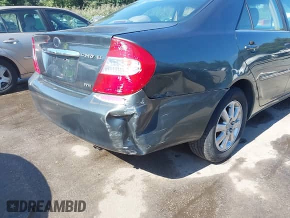 2004 Toyota Camry LE with VIN JTDBE32K540247403, listed as a IAAI auction lot 43148950 with 173,829 mi miles and . Bid and sale history available at DreamBid. Image 18.