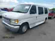 1998 Ford Econoline Cargo Recreational z VIN 1FDRE1467WHB45846, wystawiony jako IAAI lot #42598054 z przebiegiem 177 898 mil mil oraz . Historia ofert i sprzedaży dostępna na DreamBid. Obrazek 2.
