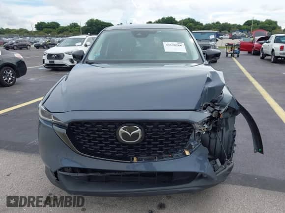 2023 Mazda CX-5 S Carbon Edition z VIN JM3KFBCM1P0132803, wystawiony jako IAAI lot #43128566 z przebiegiem 37 967 mil mil oraz . Historia ofert i sprzedaży dostępna na DreamBid. Obrazek 12.