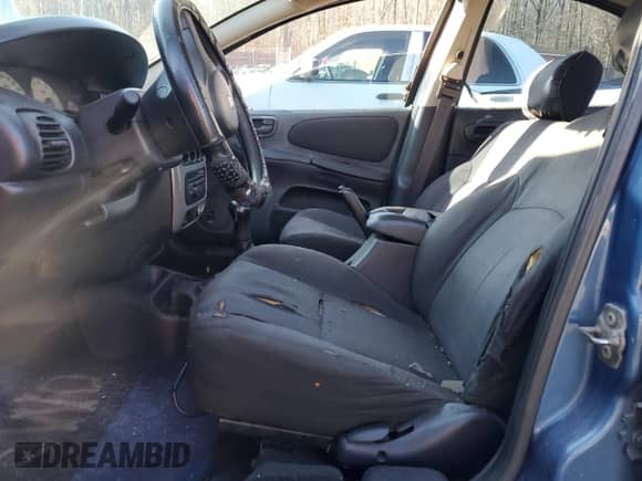 2003 Dodge Neon SXT with VIN 1B3ES56C93D140657, listed as a Copart auction lot 86829224 with 196,870 mi miles and Salvage title. Bid and sale history available at DreamBid. Image 7.