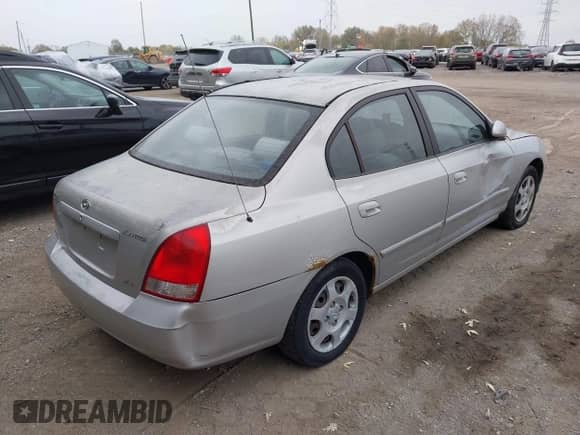 2002 Hyundai Elantra GLS z VIN KMHDN45D02U426333, wystawiony jako IAAI lot #43554505 z przebiegiem 190 605 mil mil oraz . Historia ofert i sprzedaży dostępna na DreamBid. Obrazek 4.