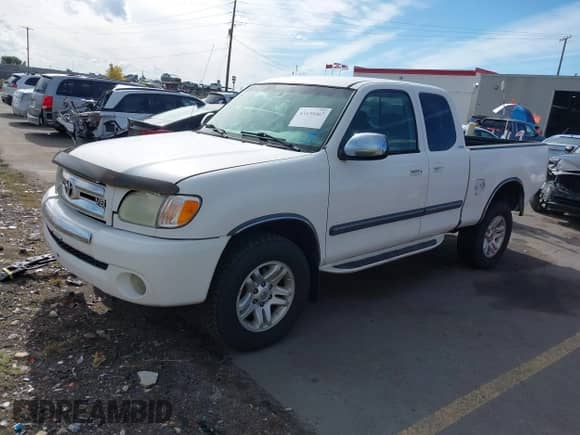 2004 Toyota Tundra SR5 z VIN 5TBBT44114S456028, wystawiony jako IAAI lot #43430467 z przebiegiem 230 434 mil mil oraz . Historia ofert i sprzedaży dostępna na DreamBid. Obrazek 19.