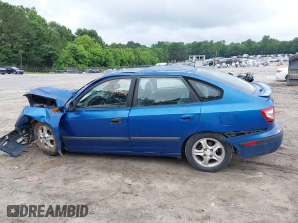 2005 Hyundai Elantra GLS z VIN KMHDN56D45U162574, wystawiony jako IAAI lot #42423833 z przebiegiem Nie podano mil oraz . Historia ofert i sprzedaży dostępna na DreamBid. Obrazek 14.