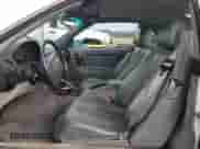 1992 Mercedes-Benz SL с VIN WDBFA66E7NF037949, выставлен на аукционе Copart как лот 44134135 с пробегом 130 910 миль миль и Чистый • Clean title. История ставок и продаж доступна на DreamBid. Изображение 7.