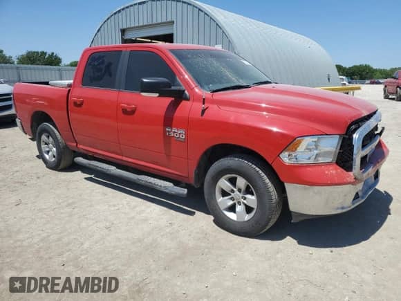 2019 Ram 1500 SLT with VIN 1C6RR7LG0KS596143, listed as a Copart auction lot 56824005 with 111,163 mi miles and Salvage title. Bid and sale history available at DreamBid. Image 4.