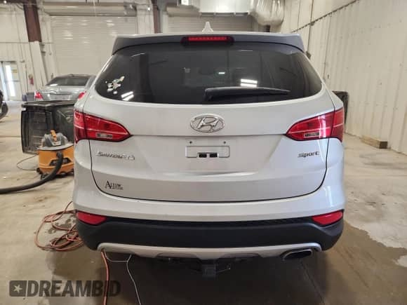 2013 Hyundai Santa Fe Sport с VIN 5XYZU3LB1DG083867, выставлен на аукционе Copart как лот 85853515 с пробегом 75 500 миль миль и Чистый • Clean title. История ставок и продаж доступна на DreamBid. Изображение 6.