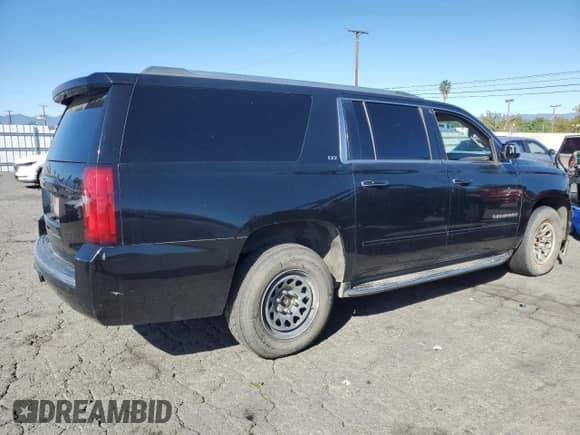2015 Chevrolet Suburban LTZ с VIN 1GNSCKKC8FR145169, выставлен на аукционе Copart как лот 87014825 с пробегом 172 308 миль миль и Чистый • Clean title. История ставок и продаж доступна на DreamBid. Изображение 3.