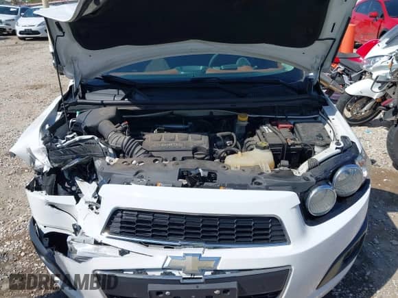 2014 Chevrolet Sonic LT z VIN 1G1JC5SB8E4100279, wystawiony jako IAAI lot #42054058 z przebiegiem 47 526 mil mil oraz . Historia ofert i sprzedaży dostępna na DreamBid. Obrazek 10.