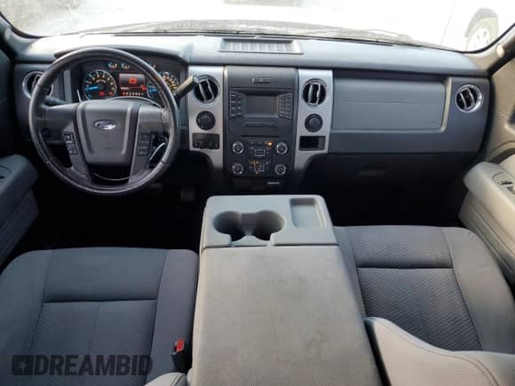 2013 Ford F-150 XLT с VIN 1FTFW1ETXDFB34437, выставлен на аукционе Copart как лот 82696165 с пробегом 148 000 миль миль и Списание • Salvage title. История ставок и продаж доступна на DreamBid. Изображение 8.