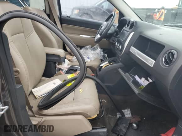 2015 Jeep Compass High Altitude with VIN 1C4NJCEA8FD305303, listed as a Copart auction lot 42140715 with 146,718 mi miles and Salvage title. Bid and sale history available at DreamBid. Image 7.