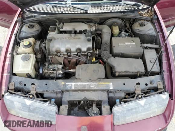 1995 Saturn SL with VIN 1G8ZH5286SZ149862, listed as a Copart auction lot 70059855 with 103,300 mi miles and Salvage title. Bid and sale history available at DreamBid. Image 11.