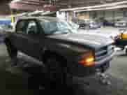 2003 Dodge Dakota Sport with VIN 1D7HG38X43S229006, listed as a Copart auction lot 44932005 with 226,935 mi miles and Salvage title. Bid and sale history available at DreamBid. Image 4.