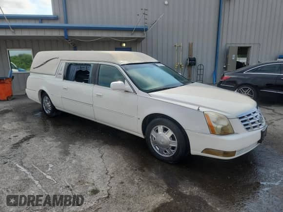 2006 Cadillac DTS Professional with VIN 1GEEH06Y36U500285, listed as a Copart auction lot 66305425 with 122,220 mi miles and Salvage title. Bid and sale history available at DreamBid. Image 4.