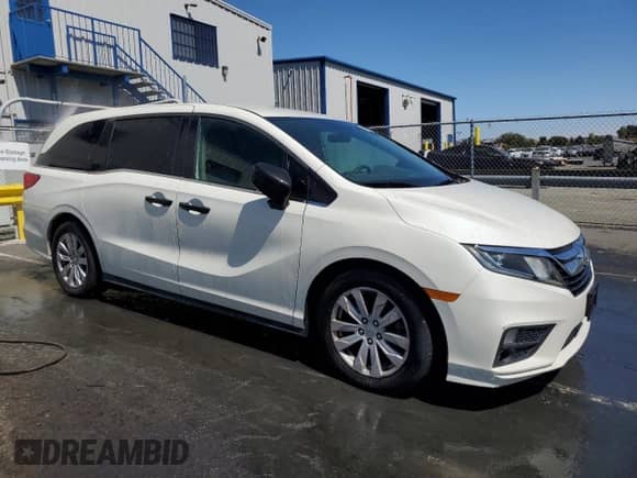 2018 Honda Odyssey LX with VIN 5FNRL6H22JB089113, listed as a Copart auction lot 70083705 with 124,837 mi miles and Clean title. Bid and sale history available at DreamBid. Image 4.